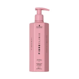 Shampoo Fibre Clinix Vibrancy Protector del Color 300ml Schwarzkopf Professional envase rosado con dosificador sobre fondo blanco